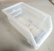 Plastic bin that can be used in bin shelving.