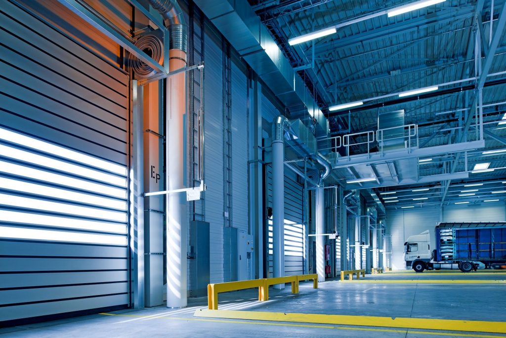 Garage doors in a loading dock area of a warehouse.