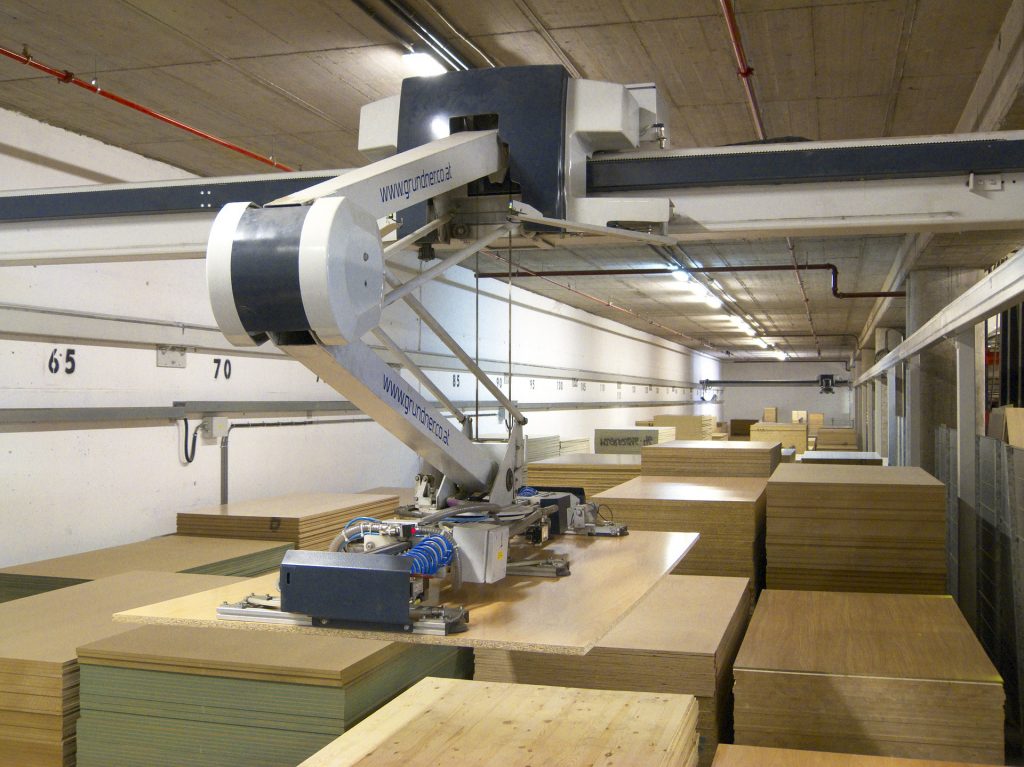 Robotic arm system in an automated warehouse.