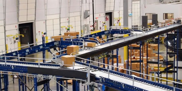 MDR conveyors feeding boxes through a shipping area