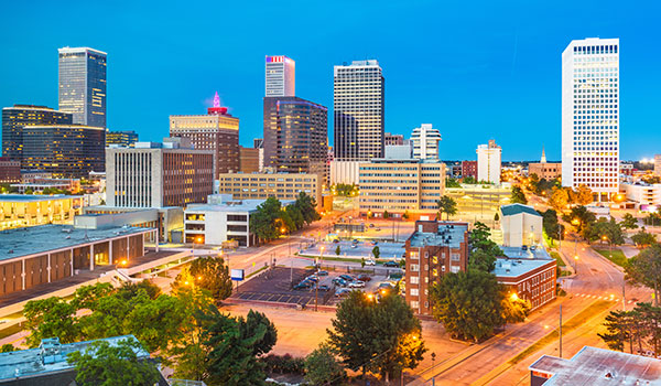 View of the Tulsa cityscape at dusk.