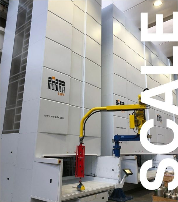 Two Modula vertical lift modules with the word SCALE