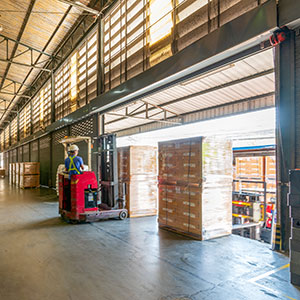 Pallets are unloaded at the receiving dock.