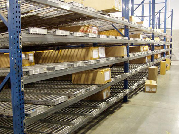 Roller rack holding boxes of products.