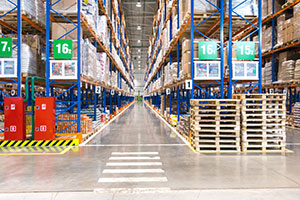 A stocked warehouse aisle.