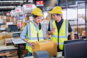 Employees reviewing proper organization techniques.