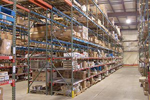 Aisles of small boxes on a racking system.