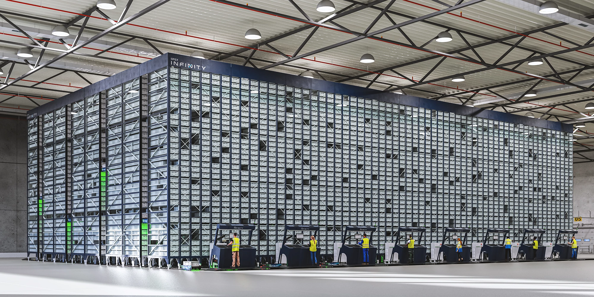 Warehouse employees operate ASRS Opex Infinity system