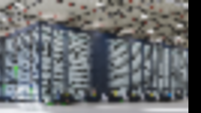 Warehouse employees operate ASRS Opex Infinity system